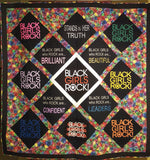 Quilt made from two t-shirts and additional embroidered squares